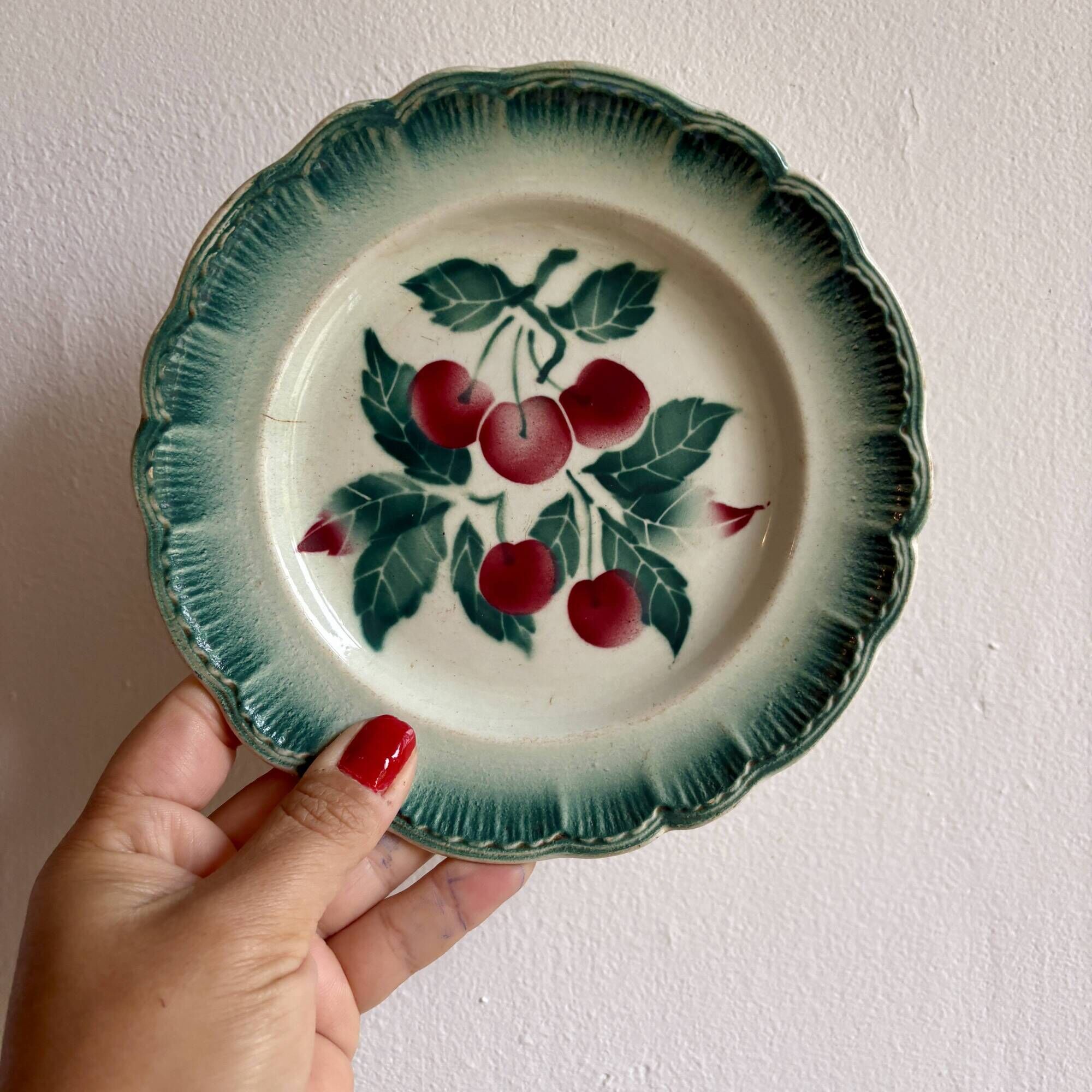 Set of 7 vintage Badonvilier dessert plates.