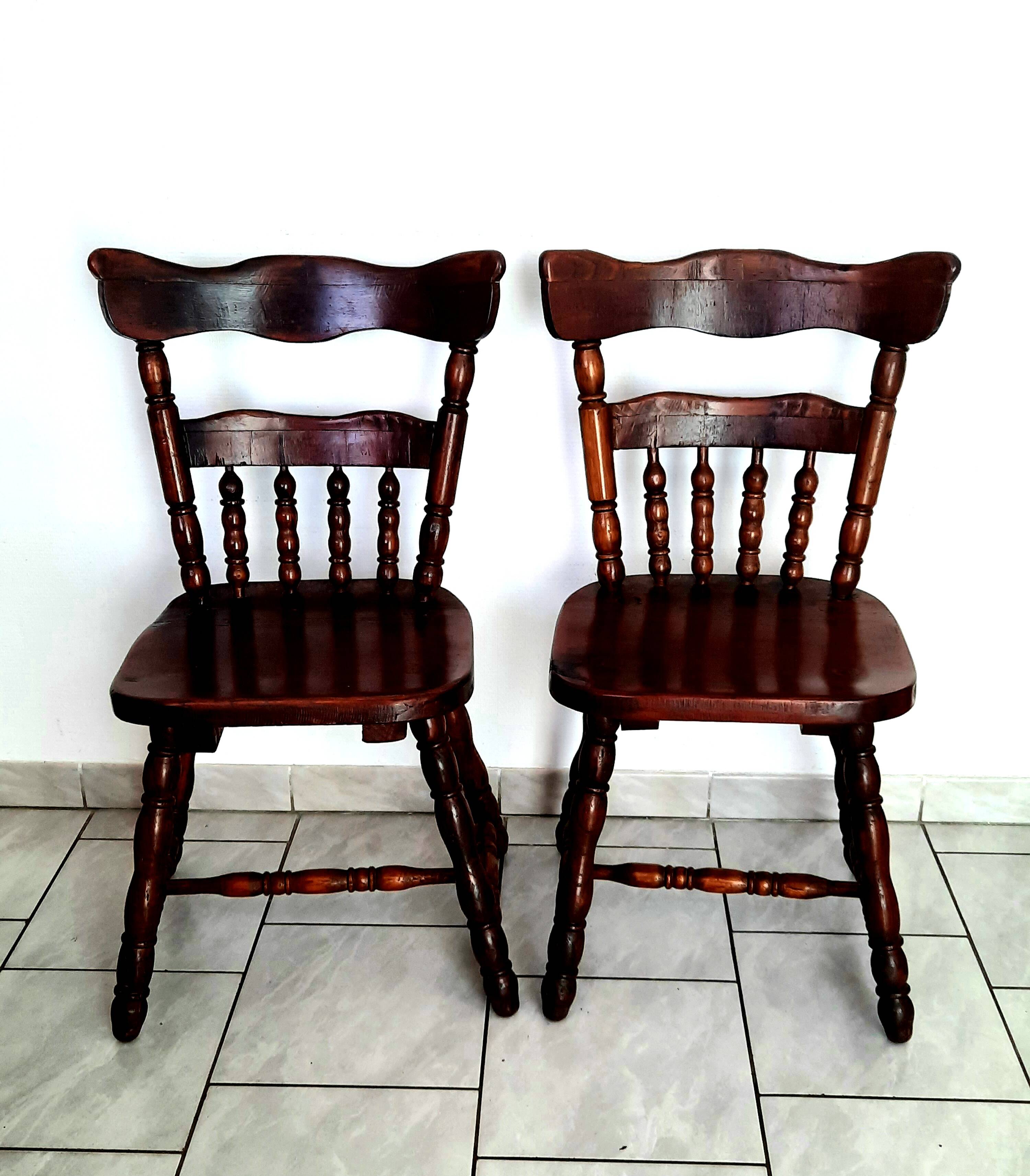 Pair of solid wood saloon chairs from the 60s and 70s