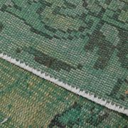 Vintage green and olive Turkish rug with a medallion, hand-knotted, 160 x 262 cm.