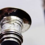 Paire de bougeoirs en métal argenté