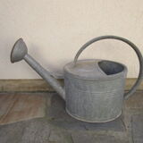 Old zinc watering can