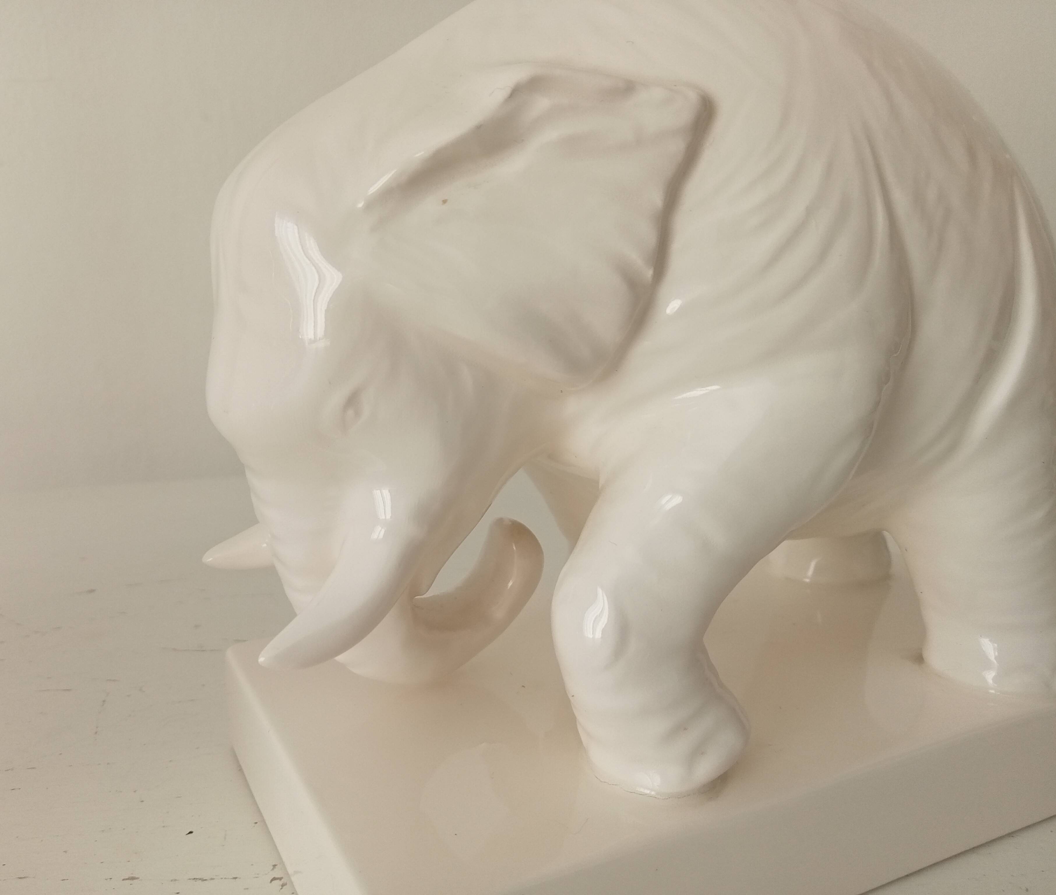 Pair of antique glazed ceramic bookends