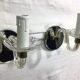 Pair of glass and mirror sconces