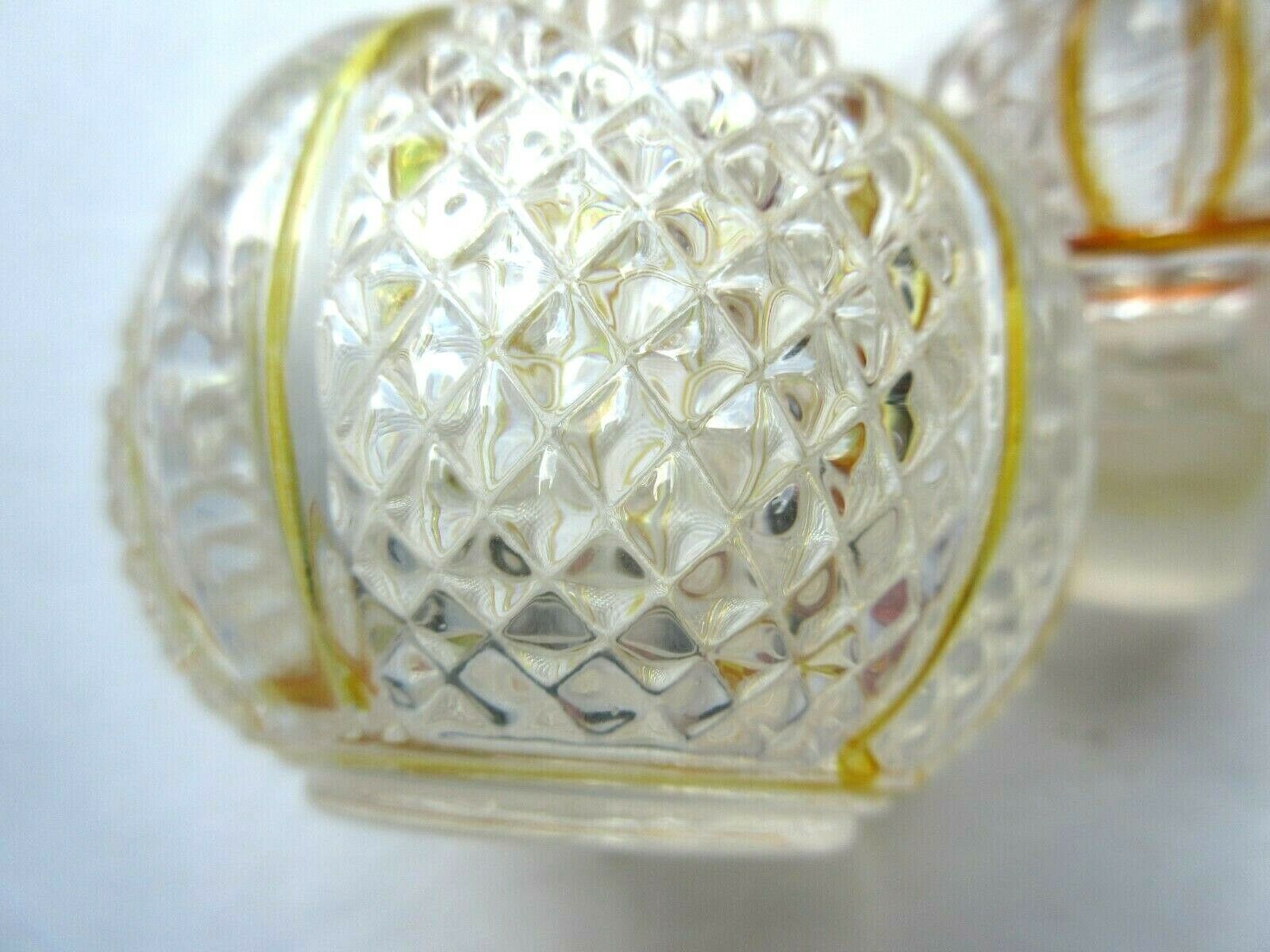 Baccarat perfume bottle, yellow eds and diamond tips