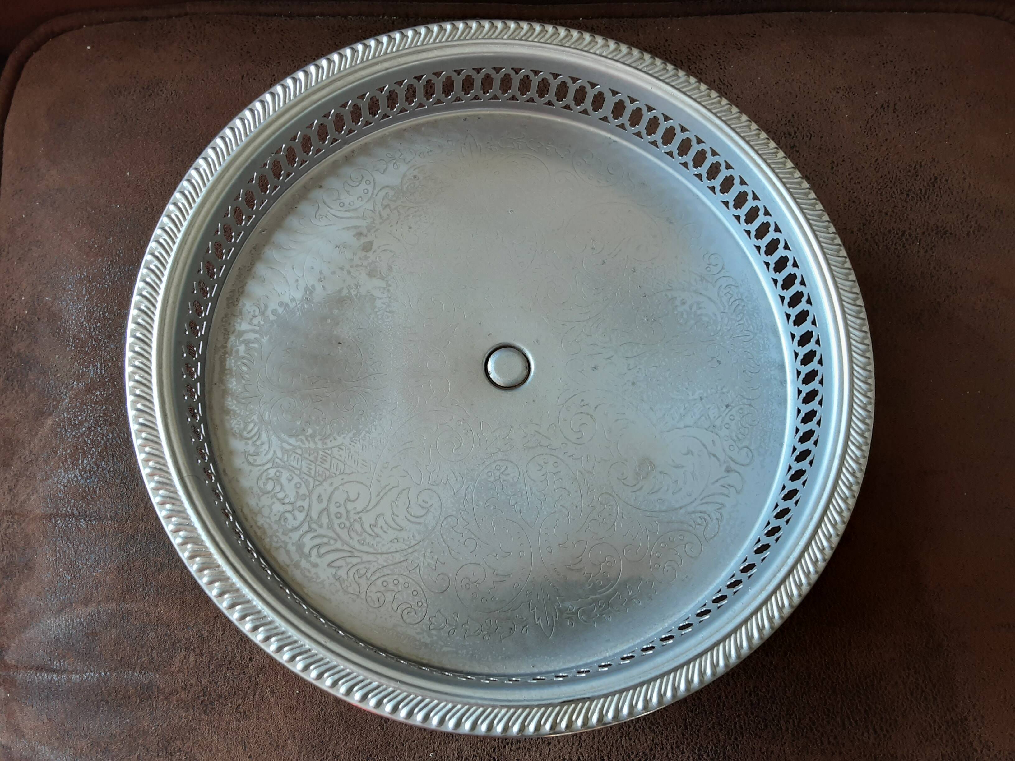 Old metal bowl on foot