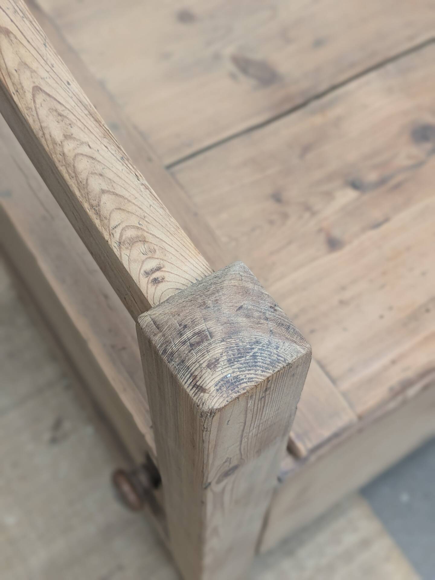 Antique armchair in raw wood