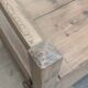 Antique armchair in raw wood