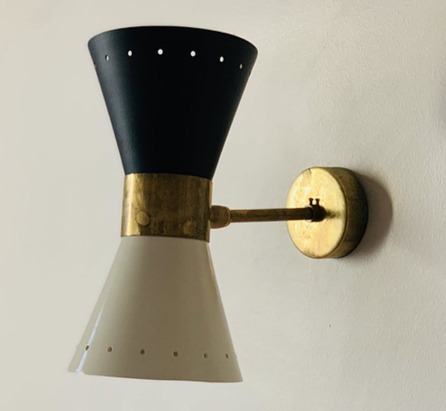 Wall sconce in the style of italian creations of the 50