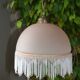 Lustrous suspension in glass paste, glass and ceramic pendants.