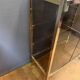 Chrome-plated brass display cabinet with smoked glass.