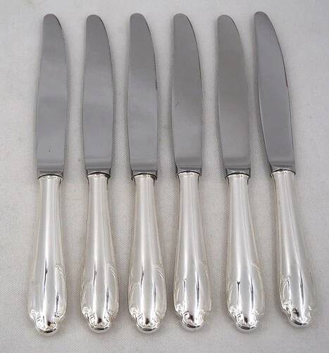 8 fourchettes et 6 couteaux de table Christofle Hotel
