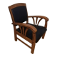 Fauteuil colonial en teck et cuir noir
