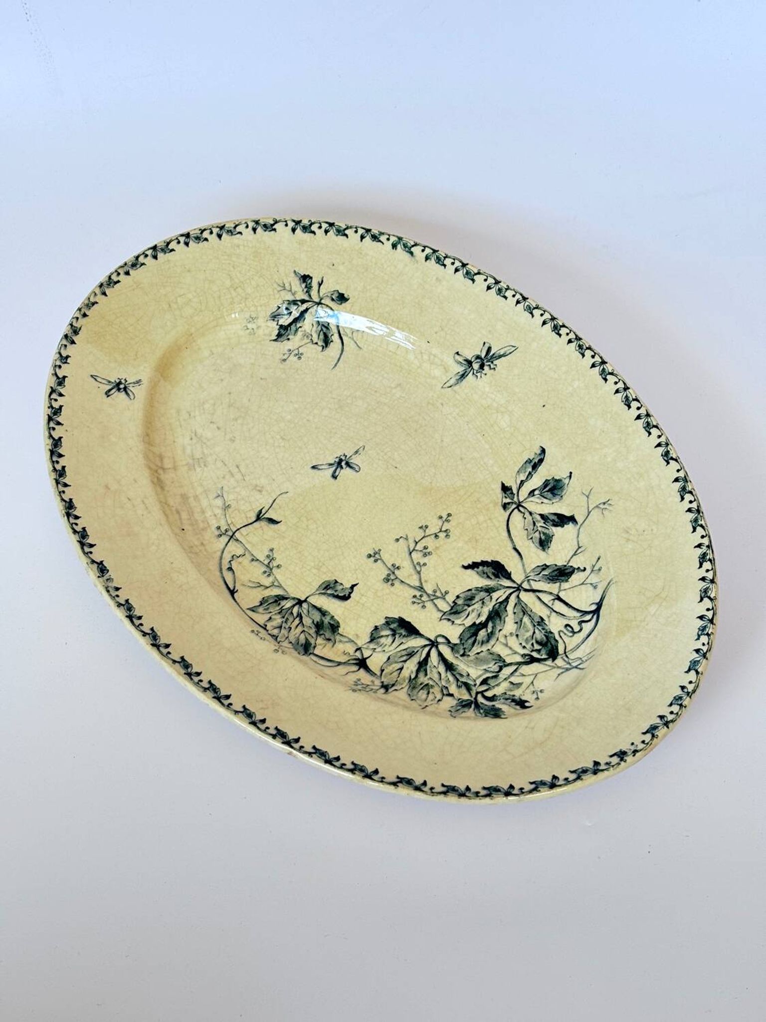 Large oval iron earth dish Gien