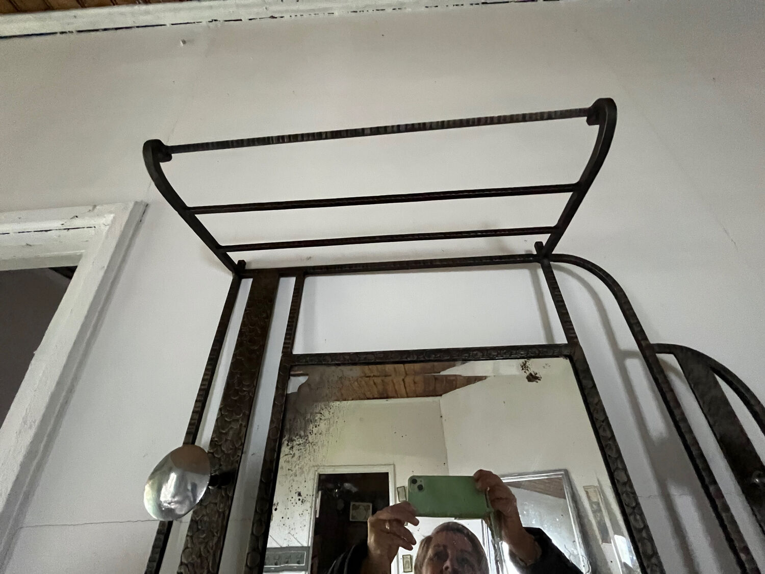 Wrought iron coat rack for the entrance