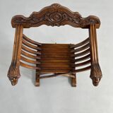 Vintage carved wooden folding armchair