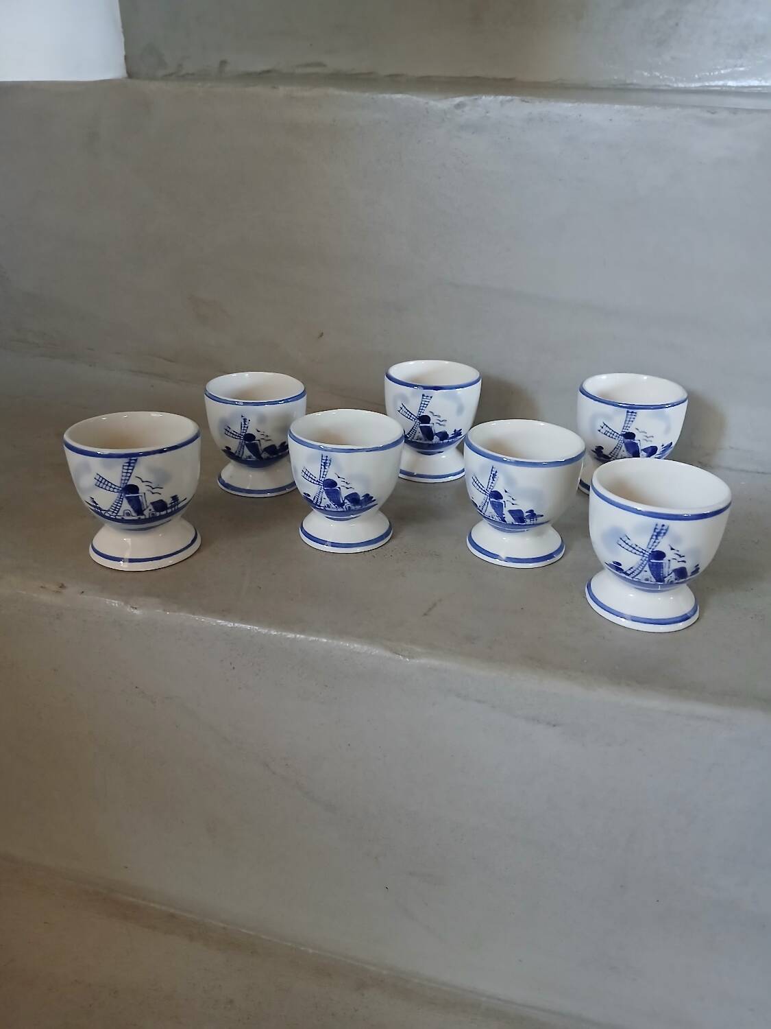 7 antique egg cups