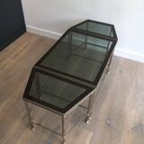 Rare three-part nickel coffee table with lacquered glass tops around the perimeter
