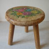 Old tripod stool with 3 wooden legs, painted floral decoration, flower bouquet