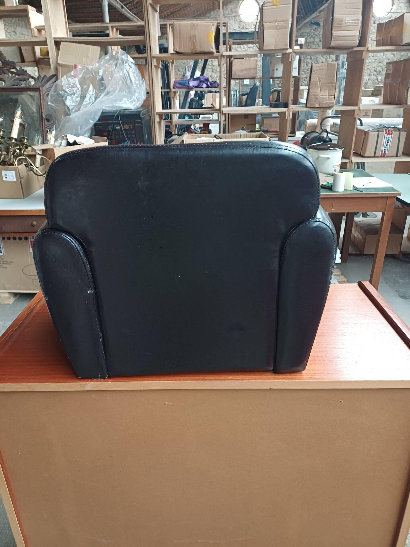 Mini black leather armchair for children
