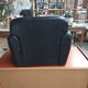 Mini black leather armchair for children
