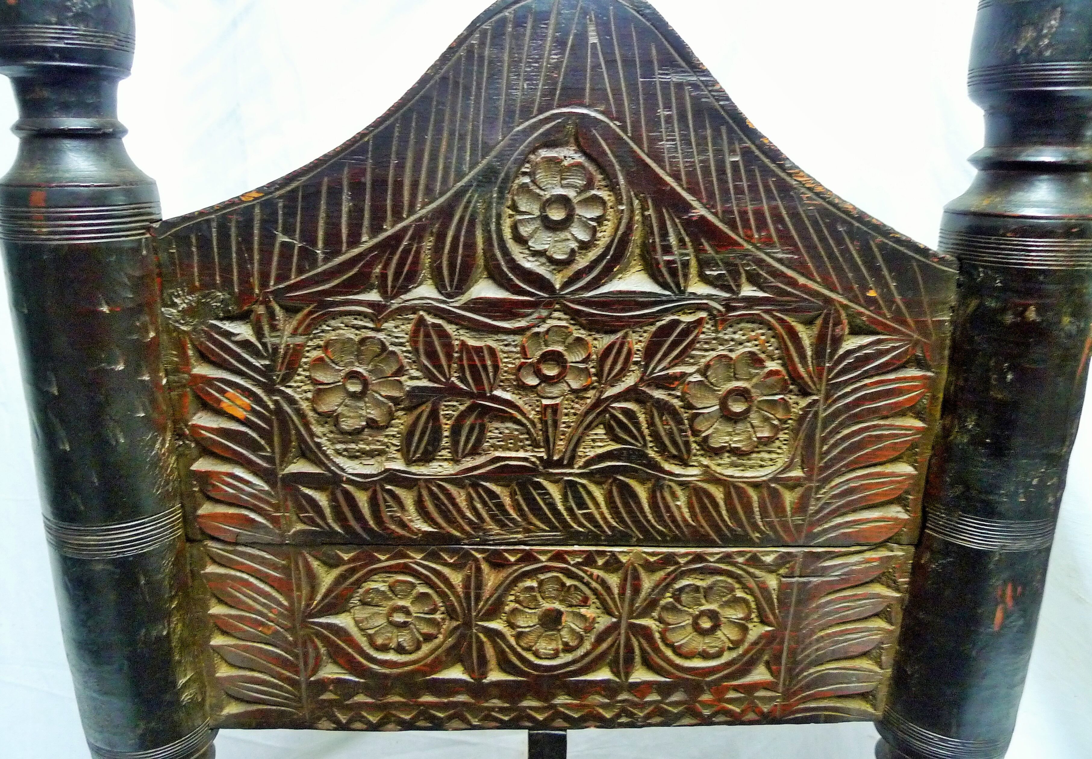 Traditional low chair in wood and leather