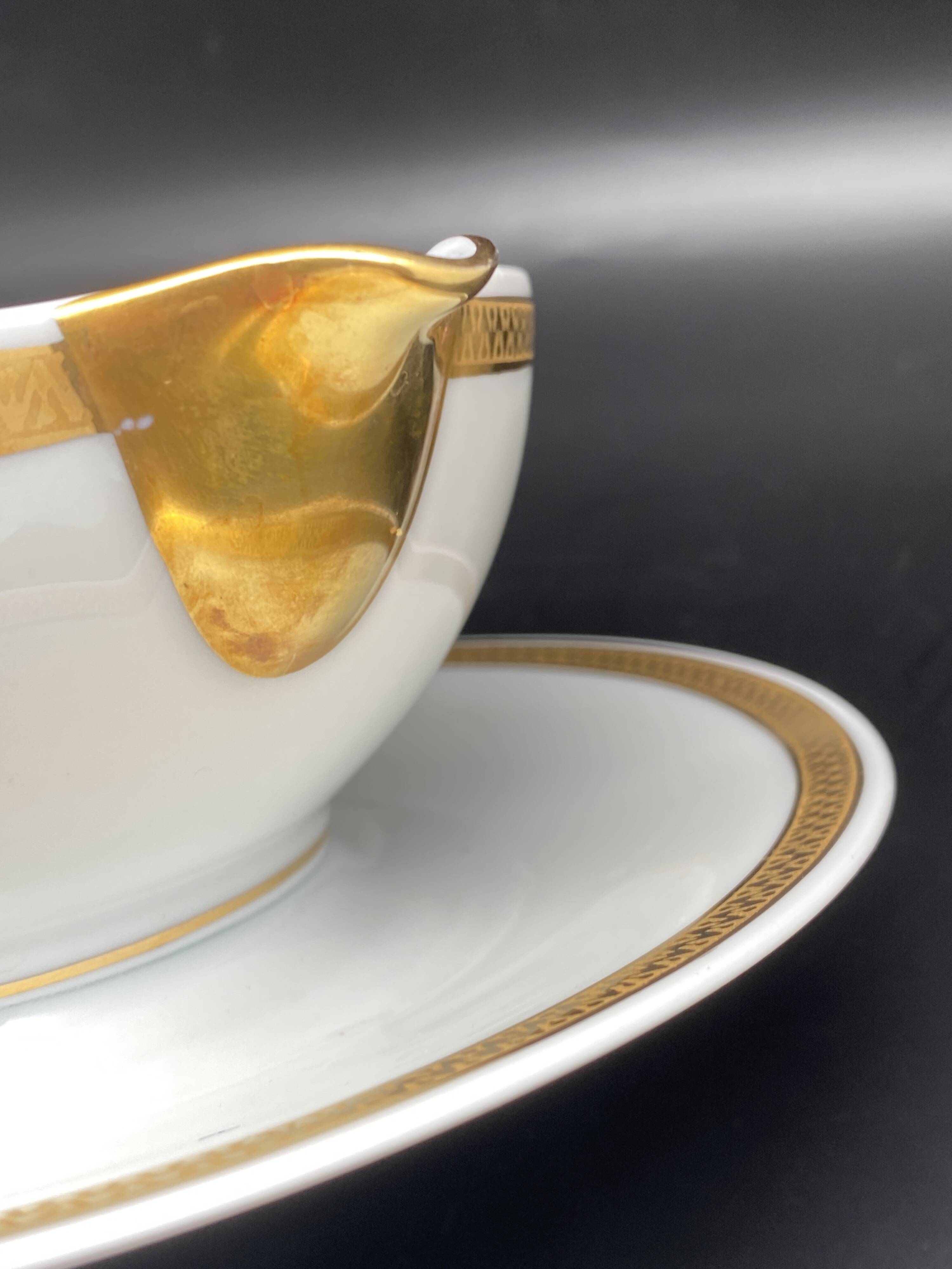 Limoges porcelain gravy boat with gold edging