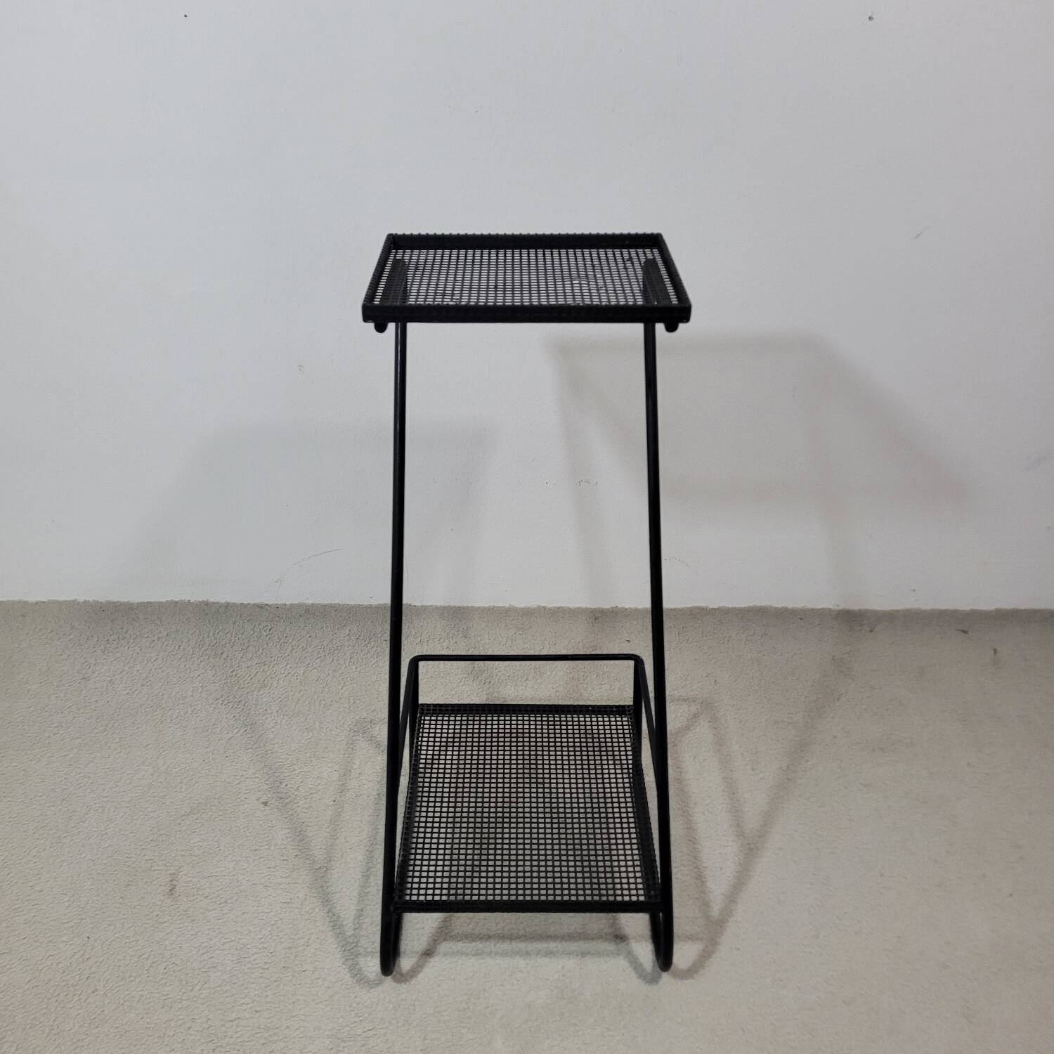 Furniture or side table in black lacquered perforated metal 1950s