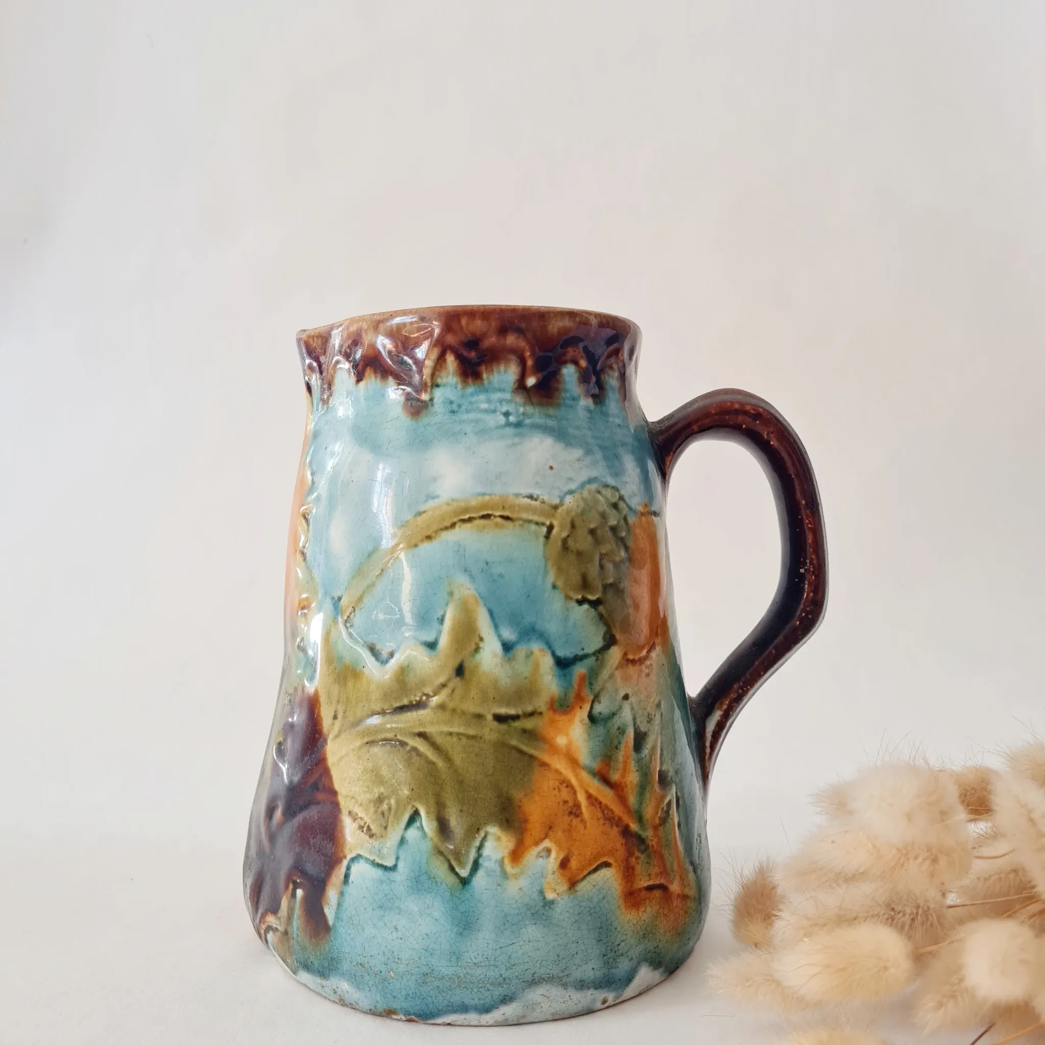 Old glazed stoneware pitcher - autumn