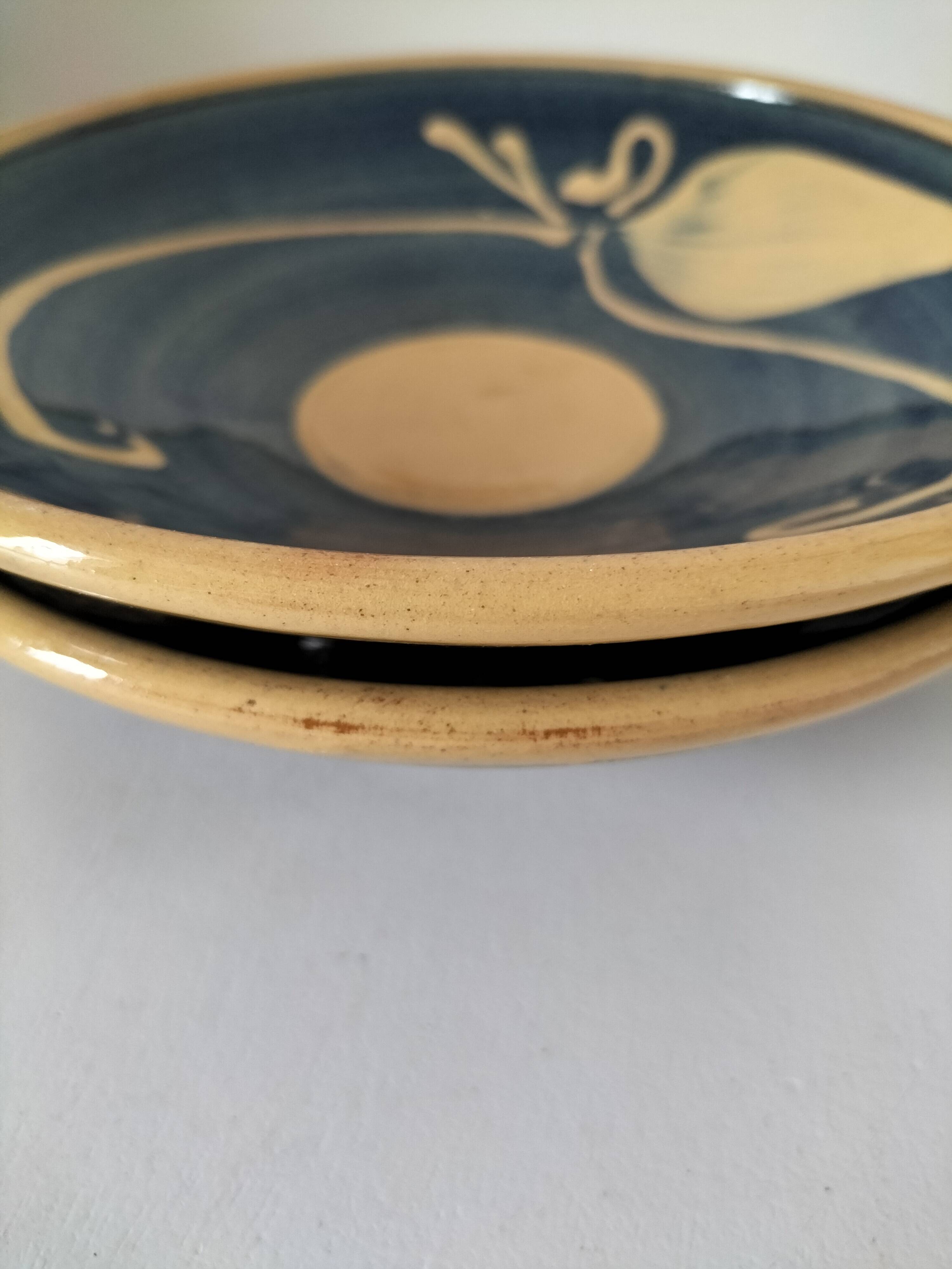 Pair of handcrafted bowls by Le Fer Rouge with blue and beige decor