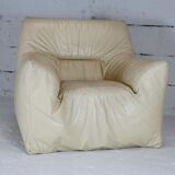 Leather armchair and cream-coloured foam, France , circa 1970