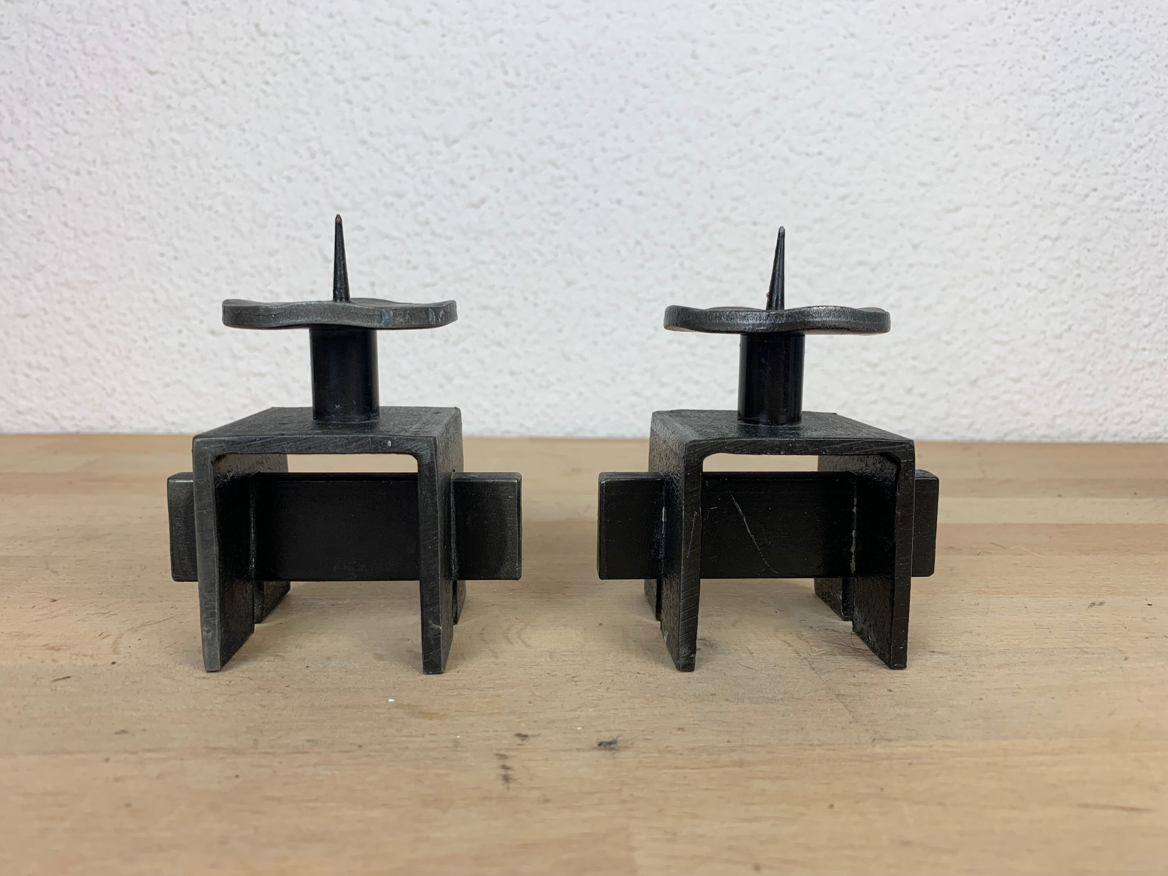Pair of brutalist wrought iron candle holders
