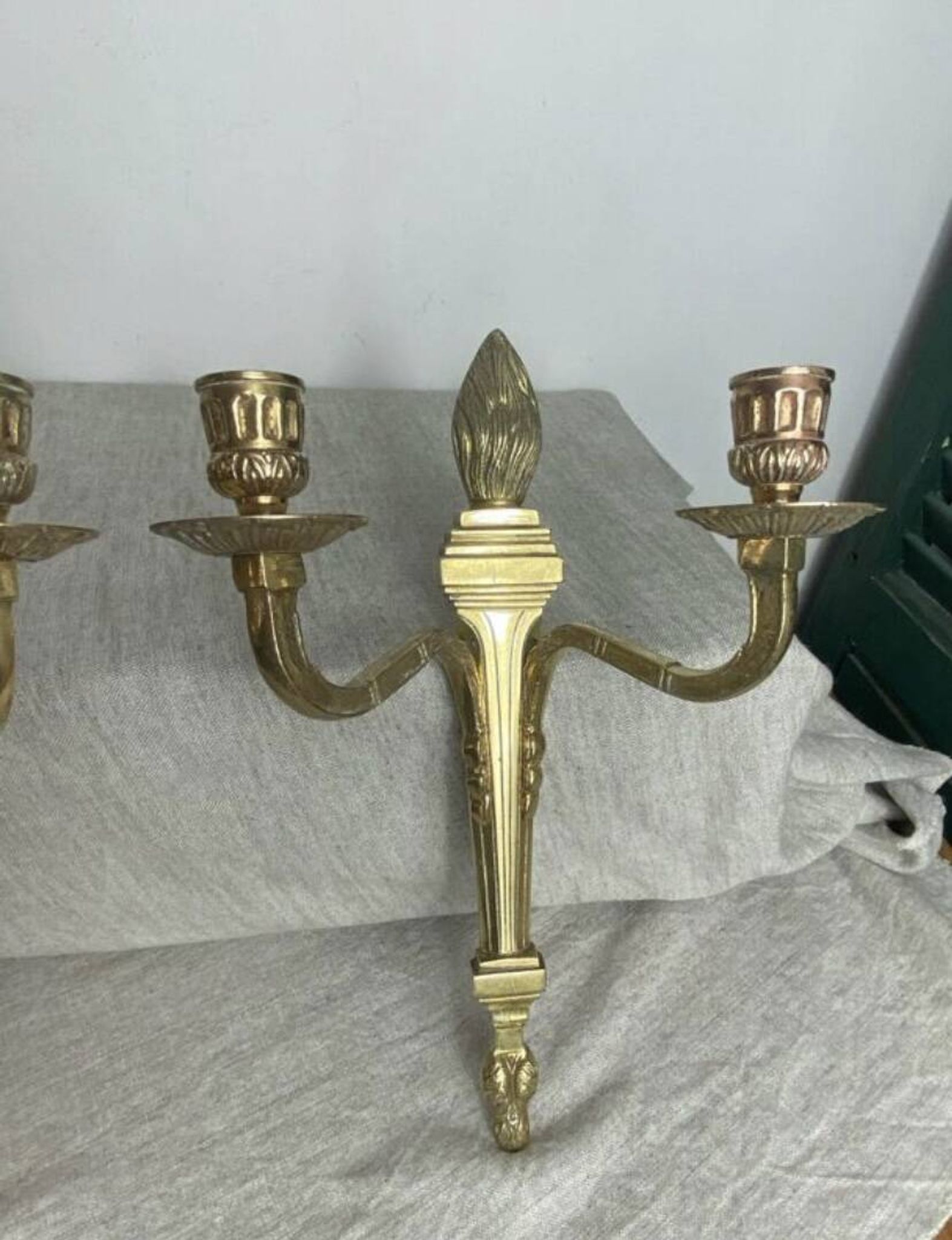 Pair of wall candle holders in bronze