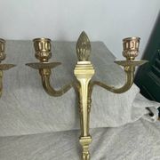 Pair of wall candle holders in bronze