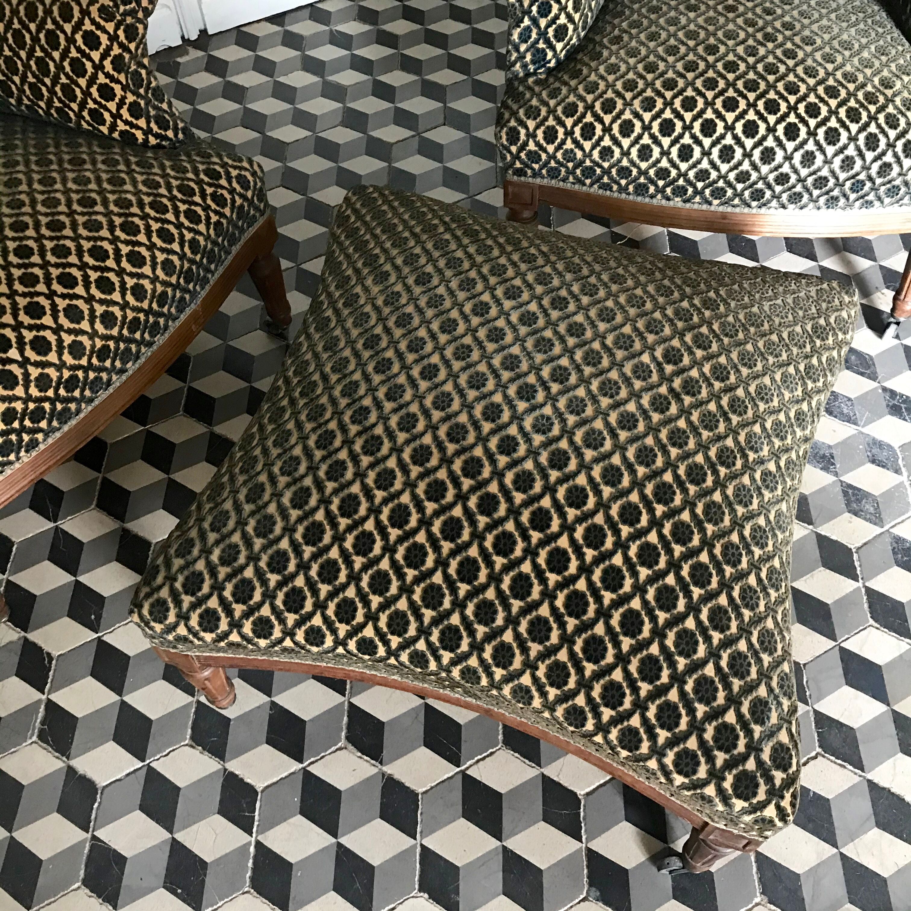 Vintage armchairs and rests feet