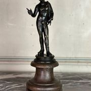 Narcissus, bronze after the antique on a wooden base, circa 1880.