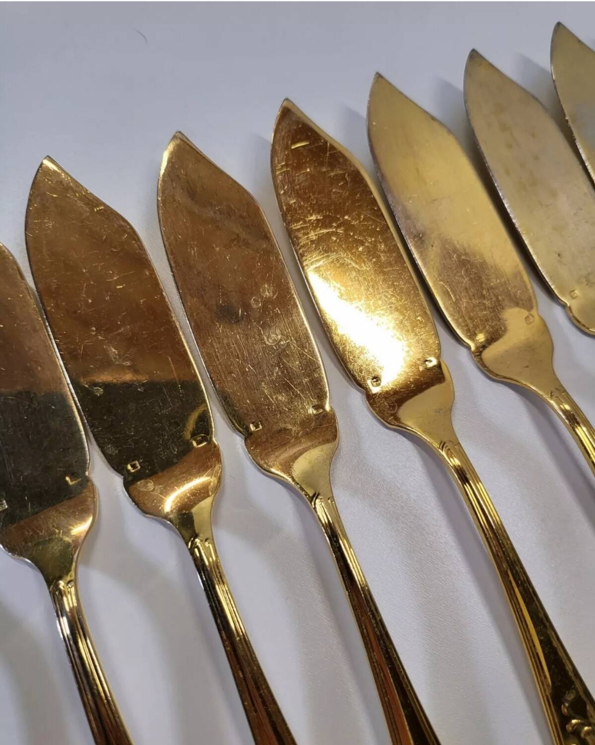 Gold metal fish cutlery, knives and forks 24 pieces