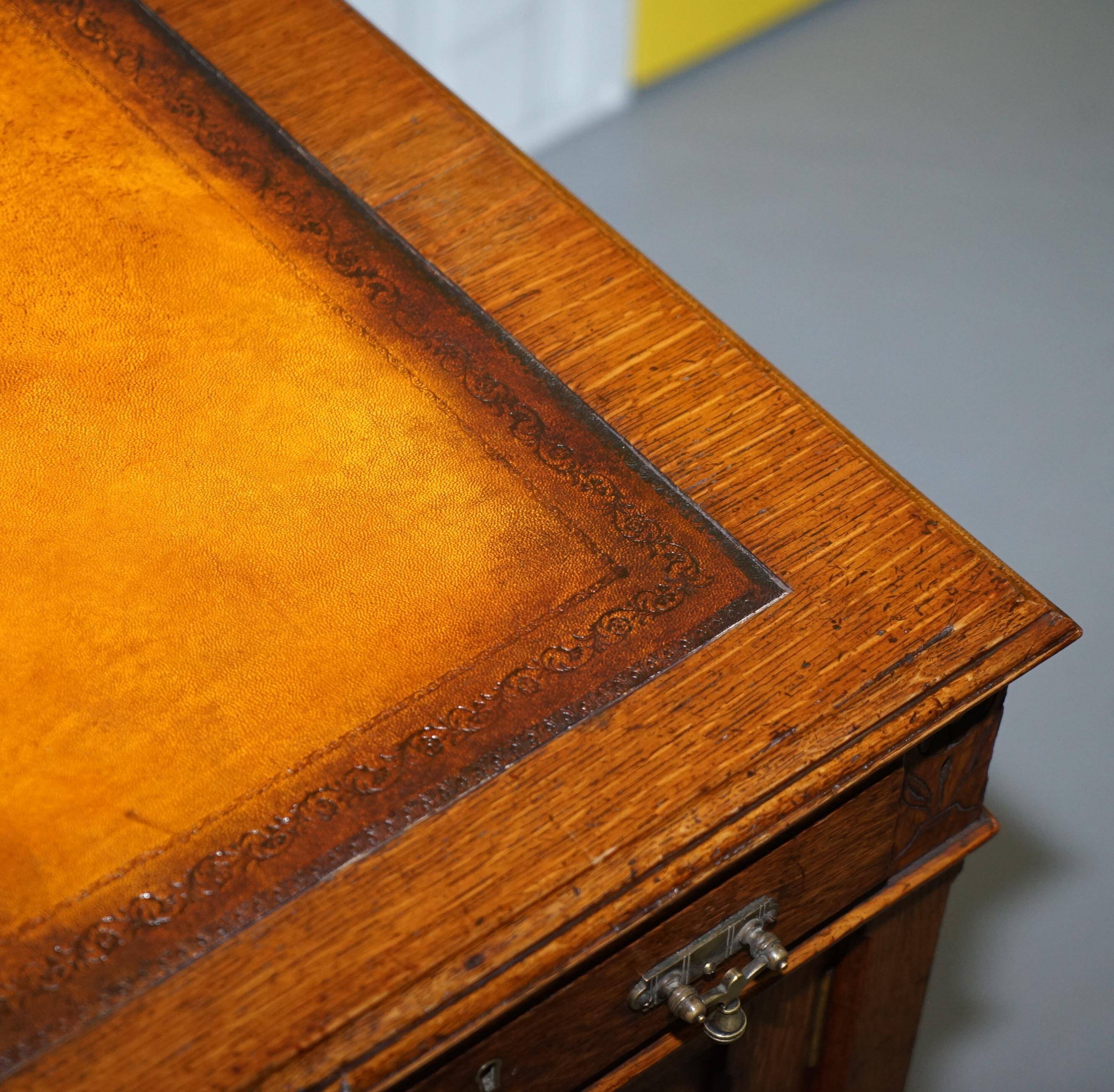 Restored Gothic desk with side bookshelves, drawer, and sloping top by Pugin Gillows.