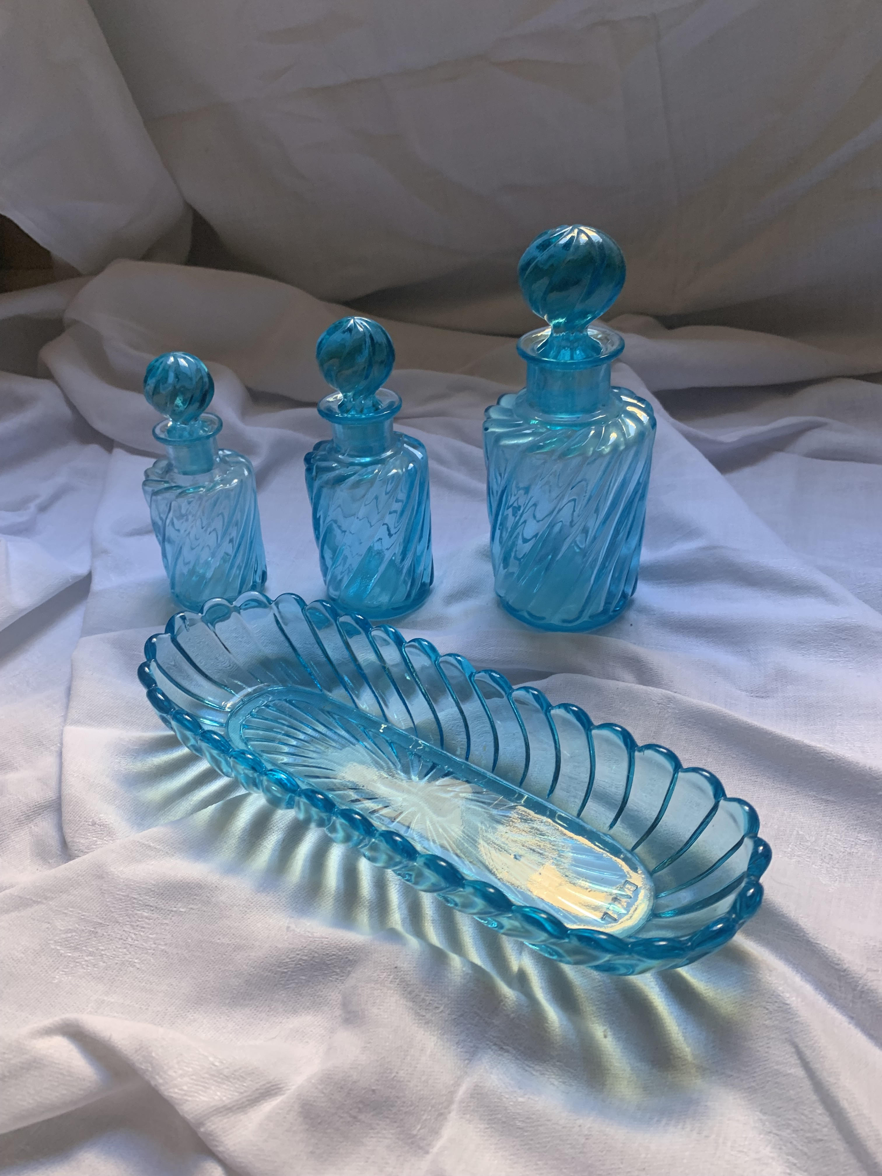 Toiletries and vintage blue glass bottles