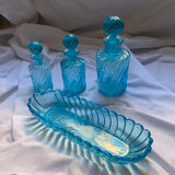 Toiletries and vintage blue glass bottles