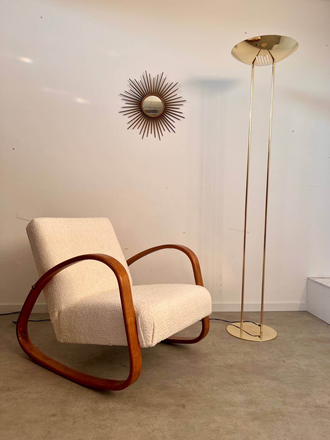 Old golden brass floor lamp with Italian design bulb from the 70s vintage