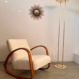 Old golden brass floor lamp with Italian design bulb from the 70s vintage