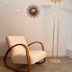 Old golden brass floor lamp with Italian design bulb from the 70s vintage
