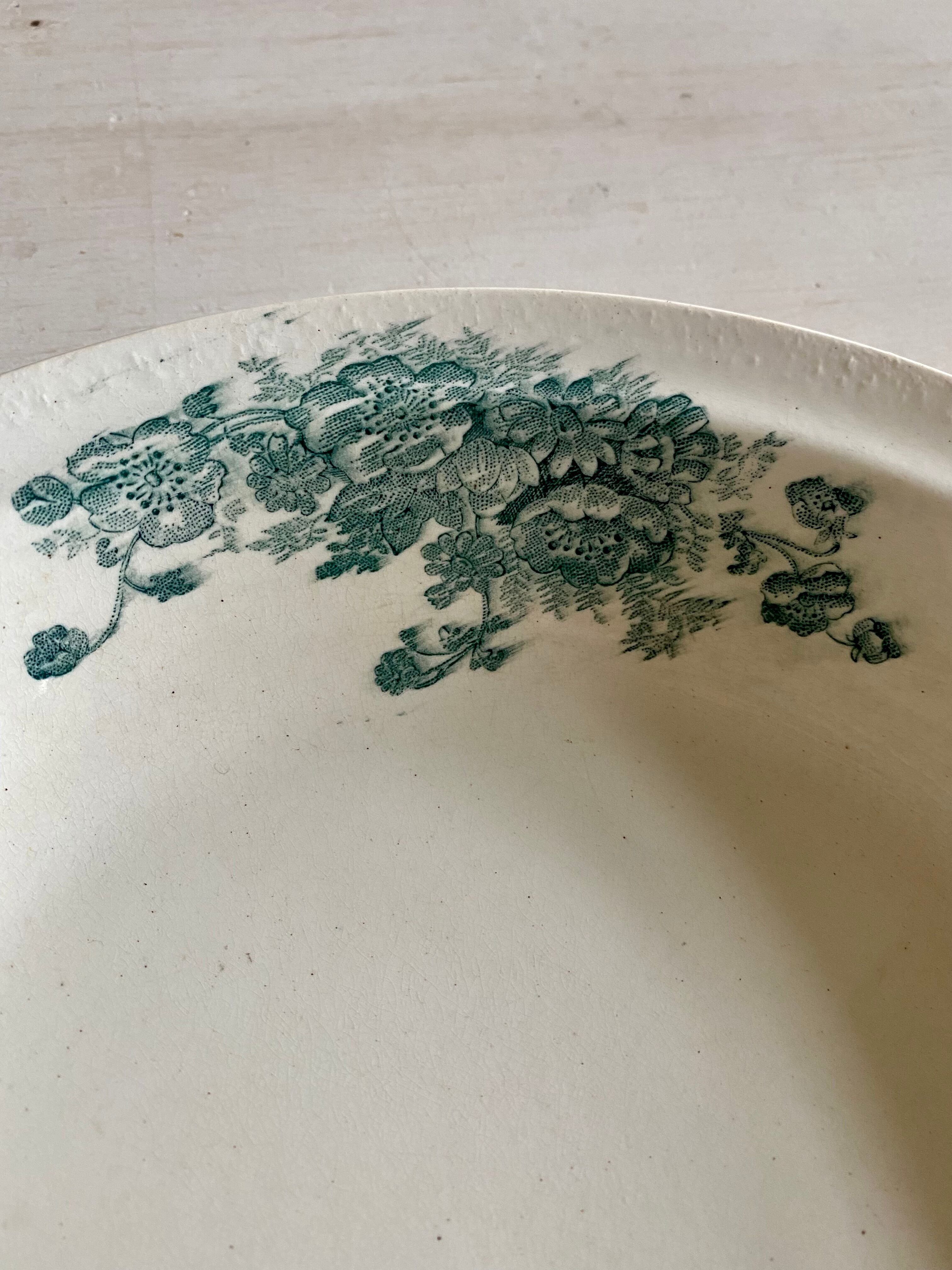 Round dish signed Bertrand Bordeaux model Anémone