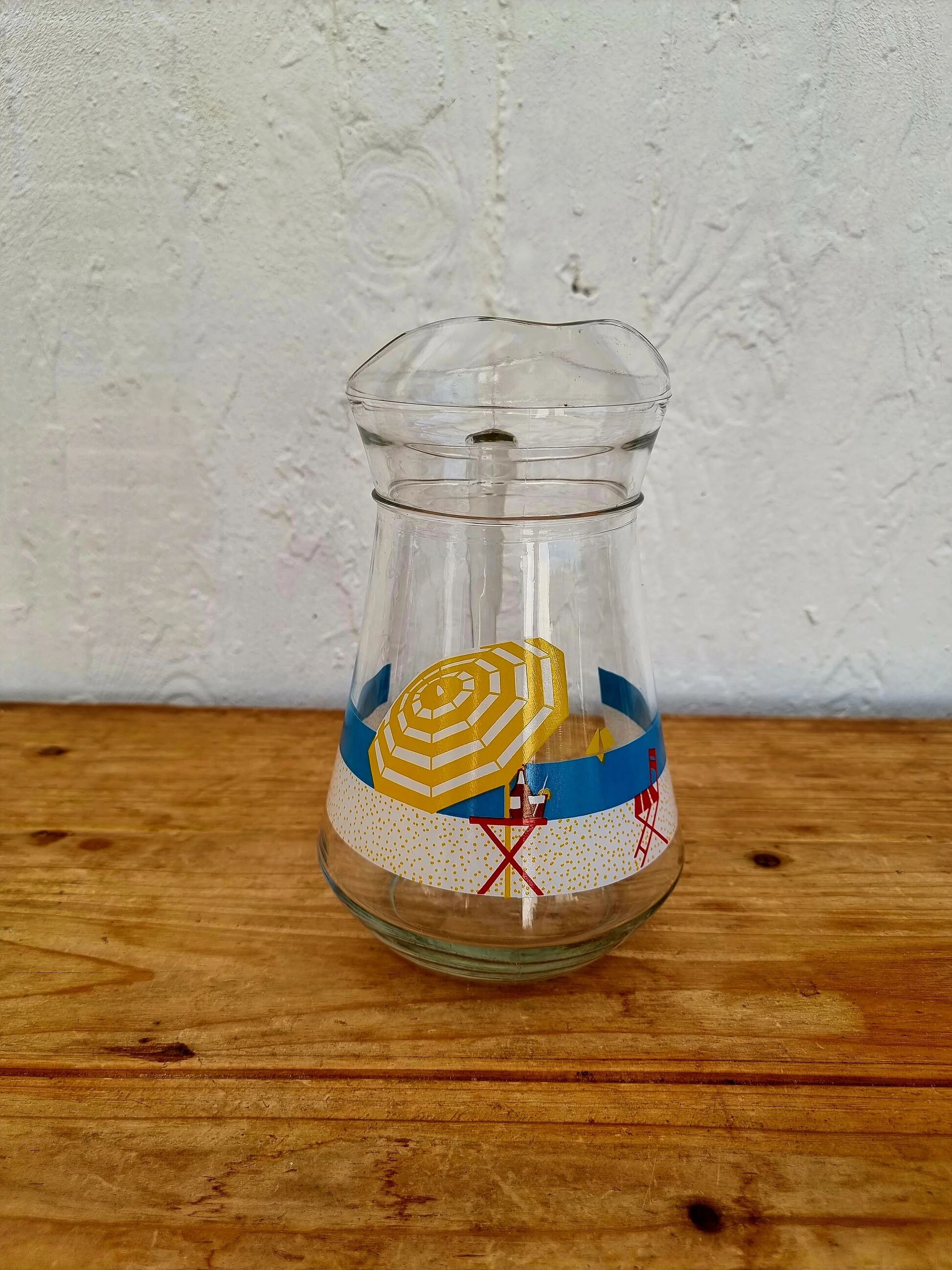 Jug with a summer design in vintage glass