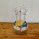 Jug with a summer design in vintage glass