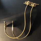 Pair of bronze tiebacks