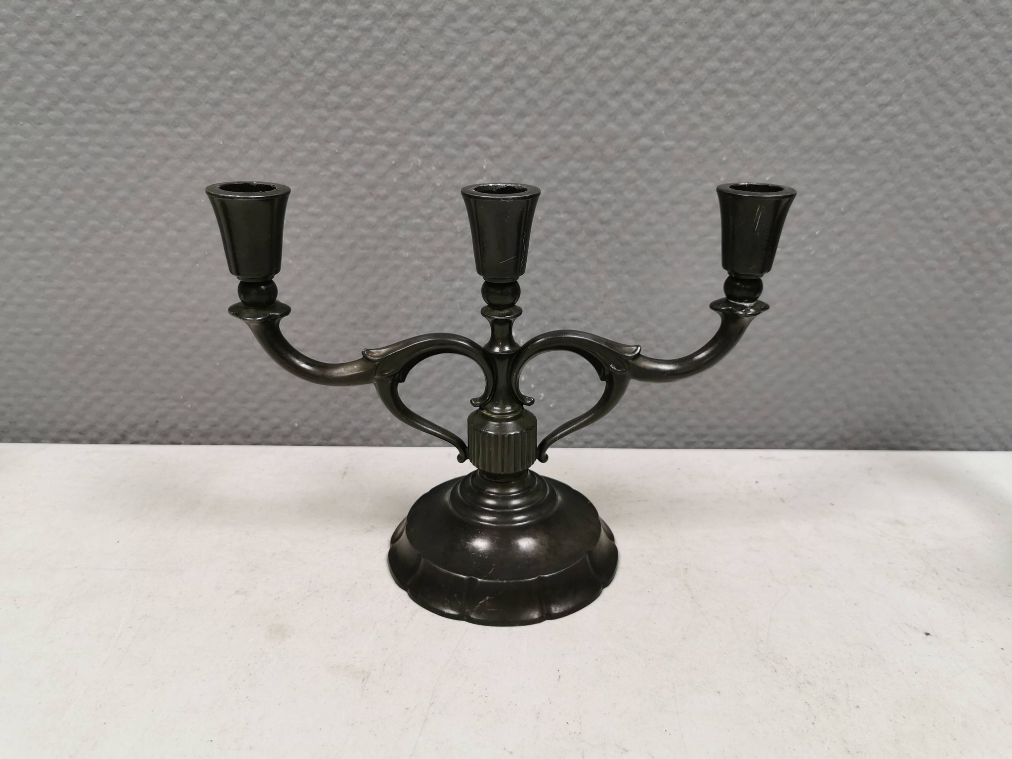 Three-armed candlesticks by Just Andersen, in Disco metal, Denmark, 1950s