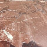 Oval dining table in red marble alicante techno