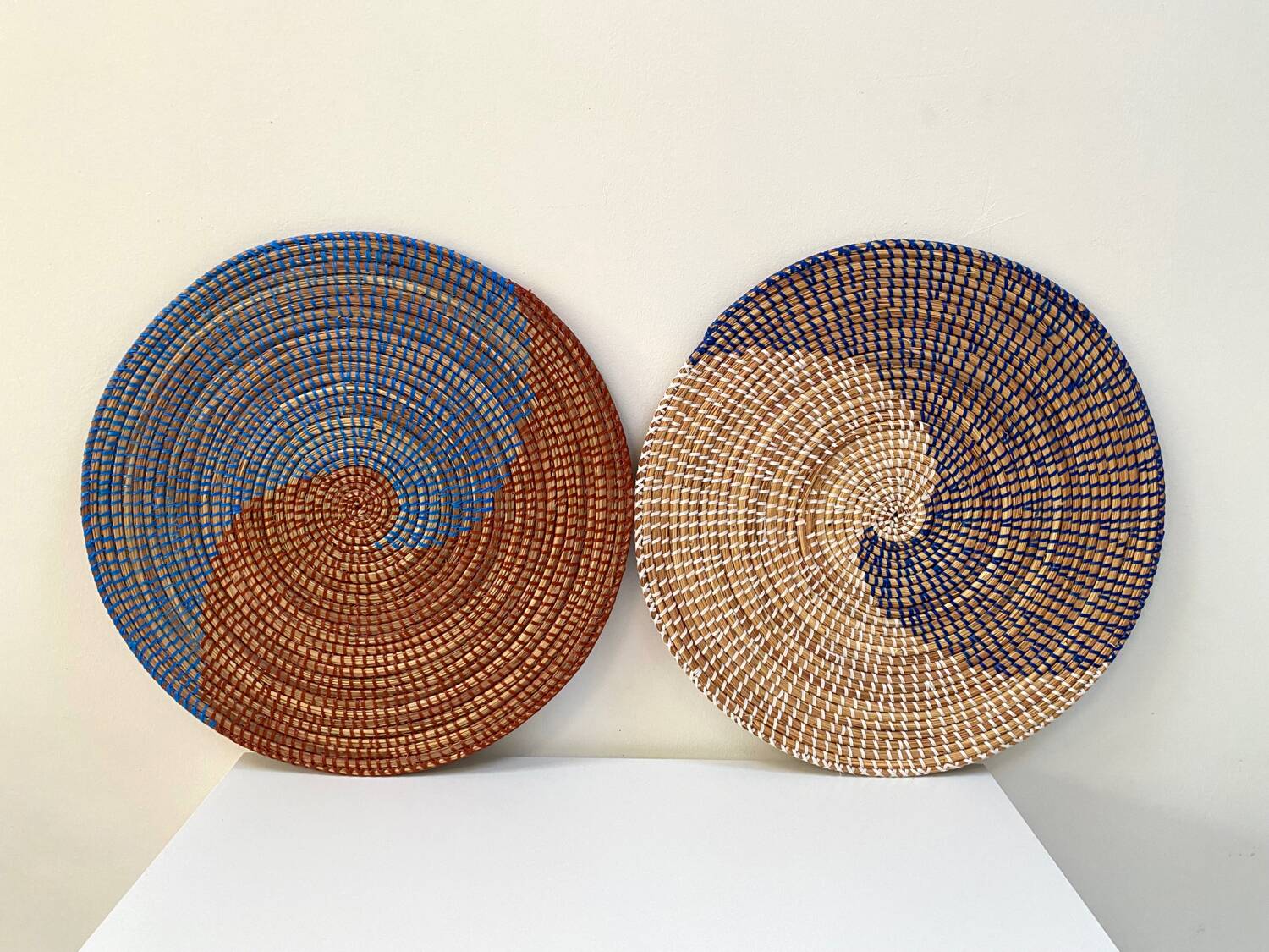 Duo of rattan trays for wall decoration
