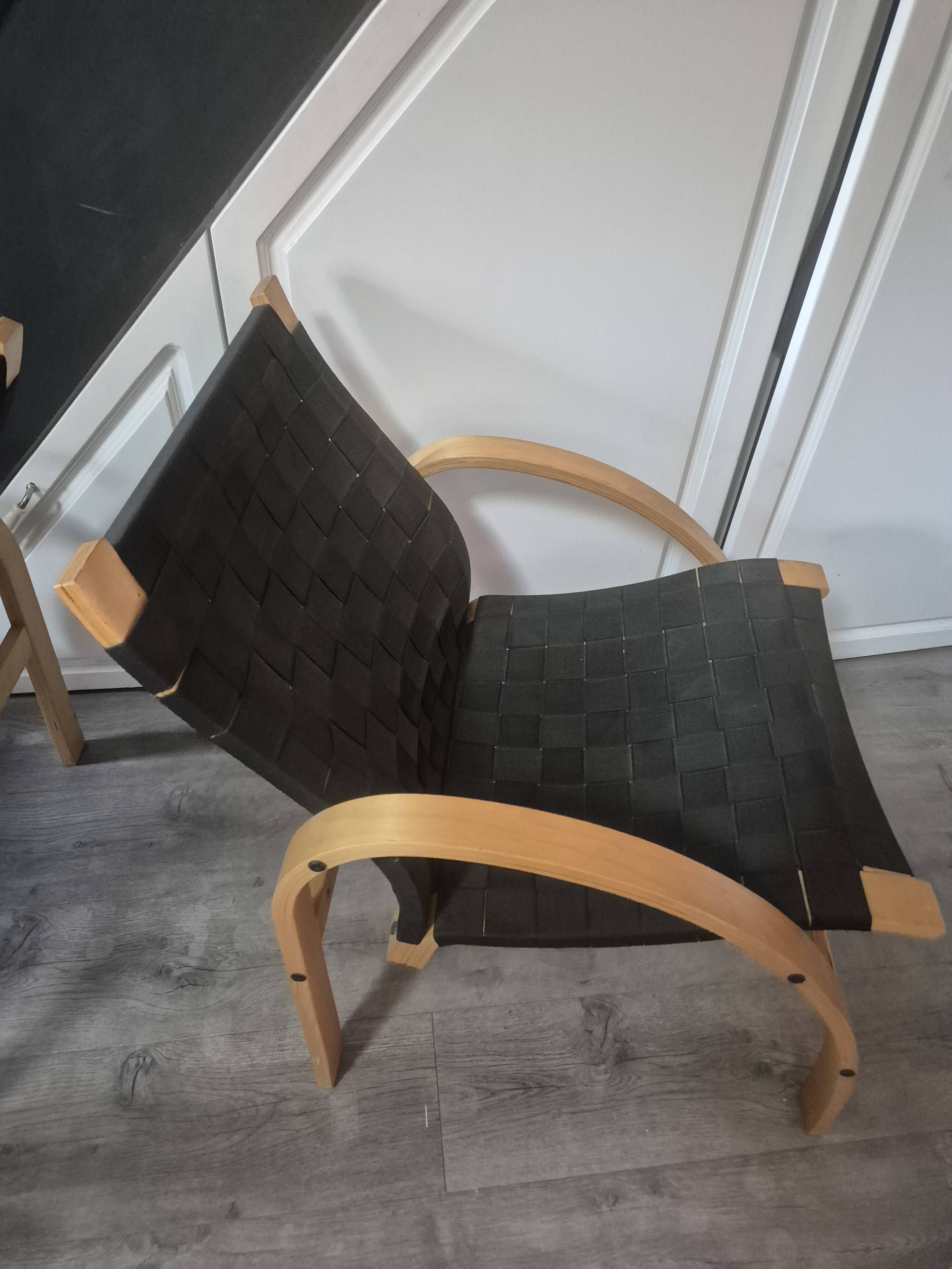 pair set of 2 armchairs with a wooden frame and black fabric weaving